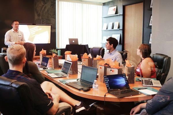A digital marketing agency in Clovis discussing growth strategies before a client meeting.